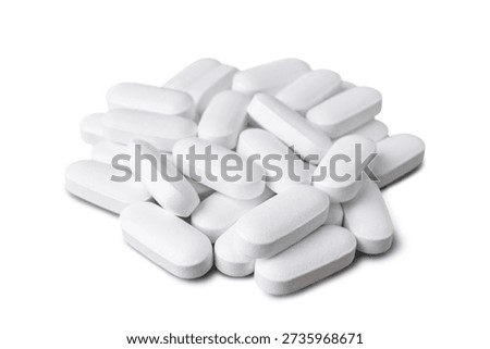 Macro pile, stack of white tablets, medicine pill capsules, supplement, vitamin isolated on white background. Medical and pharmaceutical, healthcare, treatment, medication, vitamins or supplements