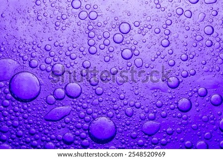 Macro purple bubble texture,oil with bubbles on Violet background. Abstract space purple violet background. Soft selective focus. macro of oil drops on water surface. copy space. air bubbles