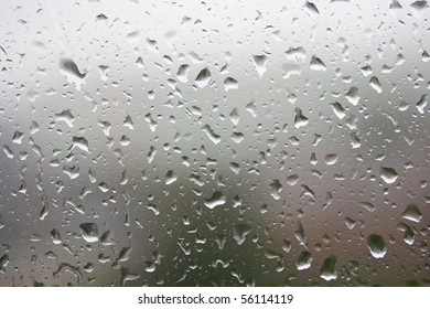 Macro, raindrops on a window pane.