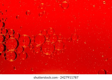 Macro red bubble texture close-up,red macro bubbles,Backgrounds, Abstract Backgrounds, Soda, Red, Carbonated,Beauty concept background. Closeup cosmetic liquid gel with bubbles on red colors backgroun