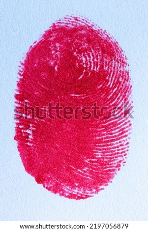 macro red human finger,Red macro fingerprint,Bloody fingerprint as background, macro. Imprint of index finger