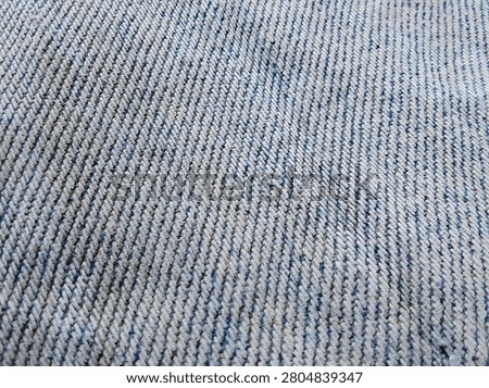 Macro Reverse Denim Fabric Texture White Weft Blue Warp

Macro photograph of denim reverse side showing white weft threads with thin blue warp lines. The clean diagonal twill pattern creates a seamless fabric base texture ideal for 3D, PBR.