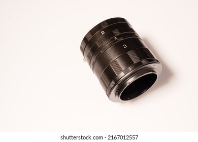 Macro rings for the camera located on a white surface. Isolate, Copy Space.