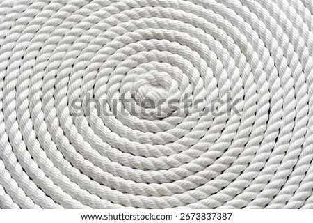 Macro rope background, of a thick rope in shape of a spiral,Photo of an vintage rope.