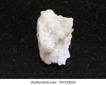 Macro Shooting Of Natural Mineral Rock Specimen - Scheelite Vein (tungsten Ore) In Raw Stone On Dark Granite Background