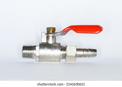 Macro shot of ball valve valve with red rubber handle. aircock valve for high pressure air