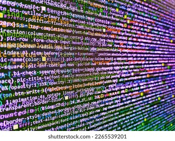 Macro shot of binary code on the monitor of an office computer. Software developer programming code. Software developer coding screen. Mining Cryptocurrency process program on display PC