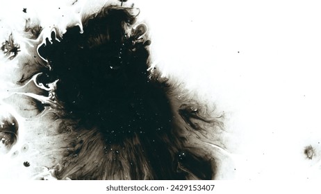 Macro Shot of Black Ink Drops Isolated on White Background - Powered by Shutterstock