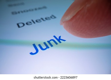 Macro shot of checking the junk email folder