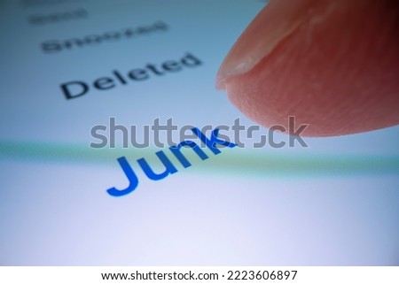 Macro shot of checking the junk email folder