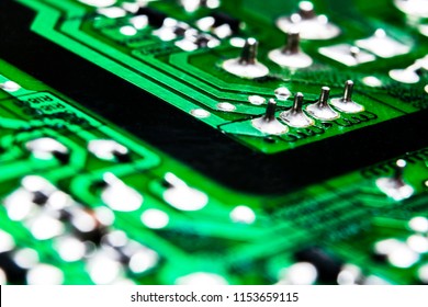 Macro shot of a Circuitboard with resistors microchips and electronic components. Computer hardware technology. Integrated communication processor. Information engineering. Semiconductor. PCB. Closeup