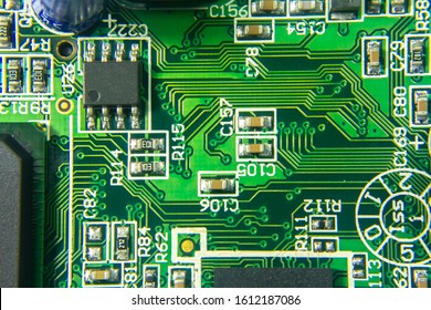 Macro shot of a Circuitboard with resistors microchips and electronic components. Computer hardware technology. Integrated communication processor