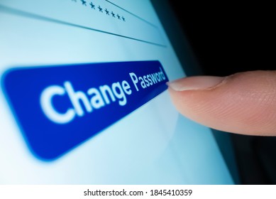 Macro shot of clicking changing password button in a tablet