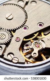 Macro Shot Of Clockwork Gears Inside The Watch