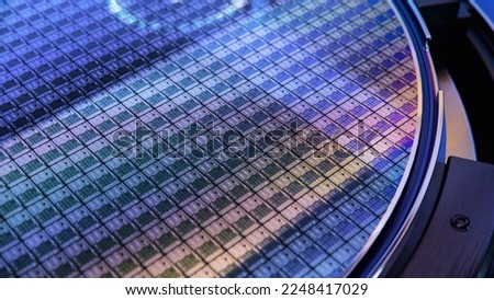 Macro Shot of Computer Chips on Silicon Wafer during Semiconductor Manufacturing at Fab or Foundry. Semicondutor Wafer Texture.