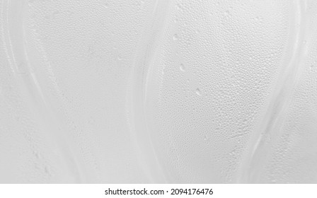 macro shot of cool water drops on white plastic bottle texture - Shutterstock ID 2094176476
