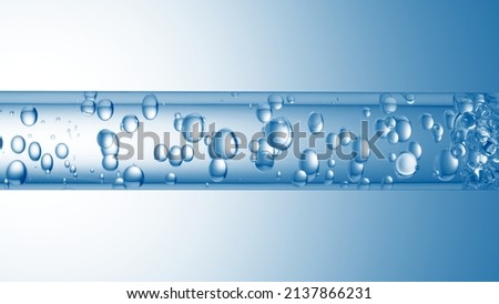 Macro shot of different sized clear bubbles flowing in glass tube with clear liquid on pale blue background | Abstract body care cosmetics mixing concept