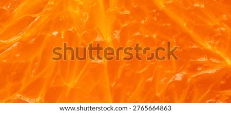 Macro shot of fresh orange pulp texture background,Extreme close-up macro photography of fresh juicy orange fruit pulp. The image highlights the vibrant orange texture, translucent juice vesicles, and organic patterns of the citrus fruit. Perfect for food, healthy lifestyle, and natural background concepts.
