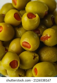 Macro Shot. Green Stuffed Olives. Large Group Of Objects. Healthy Vegetarian Food. Vitamins, Antioxidants. Snacks, Banquet, Holiday, Picnic. Restaurant, Hotel, Cafe, Supermarket.