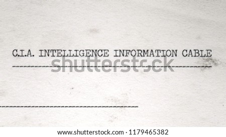 Macro shot of the header of a redacted document made with a typewriter (fake mock-up). Source: public domain list of Oswald items after Kennedy assassination, recreated from scratch.