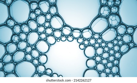 Macro Shot Of Many Clear Different Sized Bubbles Connected Tightly Each To Other Creating A Grid On Cyan Background | Abstract Beauty Product Ingredient Shot