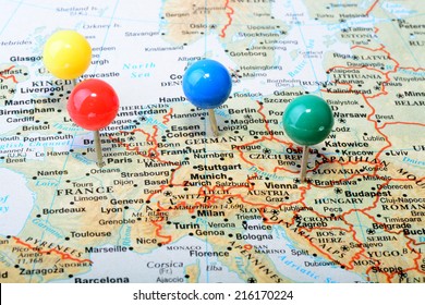 Macro Shot Of A Map Showing Main Western Europe Cities With A Colorful Tack