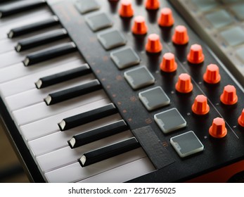 Macro Shot. MIDI Keyboard Is A Modern Electronic Musical Instrument. Professional Equipment For Recording Studio, Music Studio. There Are No People In The Photo.