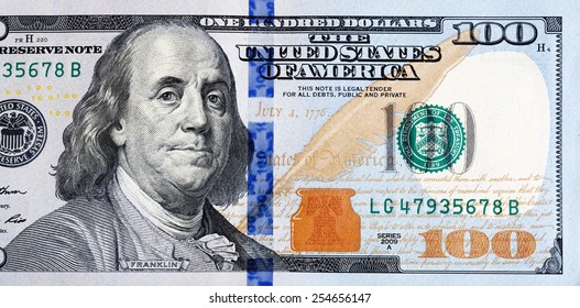 Macro shot of a new 100 dollar bill.