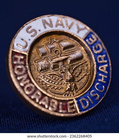 Macro Shot: Old U.S. Navy Honorable Discharge Pin Up Close