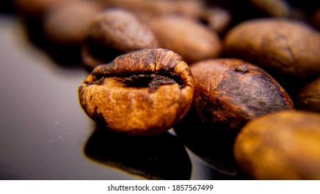 Macro shot over roasted coffee beans - food photography