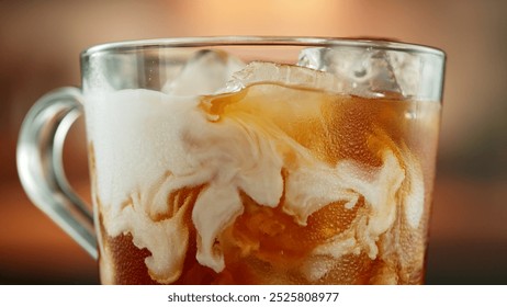 Macro Shot of Pouring Milk into Ice Coffee, Close-up - Powered by Shutterstock - Get 15% off with code: PIKWIZARD15