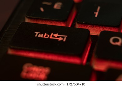 Macro Shot Of A Red Keyboard Button TAB