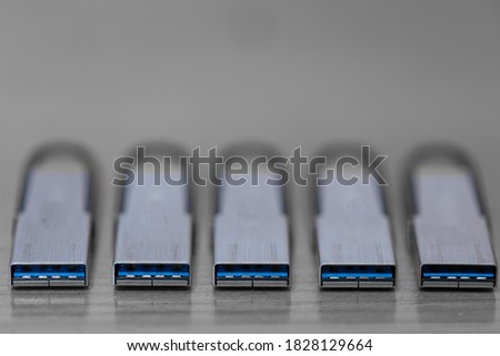 Macro shot of a row of USB memory sticks