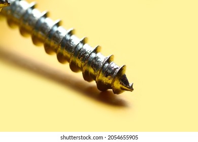 Macro shot of screw thread. It is a ridge wrapped around a cylinder or cone in the form of a helix