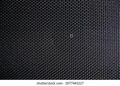 Macro Shot Of Speaker Grille. Vintage Effect. Close Up Shot Of A Round Speaker. Acoustic Broadband Speaker. Luxury Car Stereo System Speaker. Holes In A Metal Lattice.