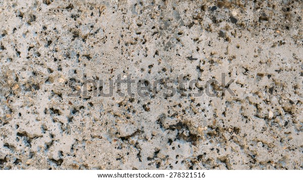 Macro shot of the surface of the cinder block\
. Cinder block of cement and\
clinker