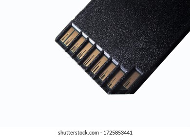 Macro shot of used flash memory sd card connectors with wear marks. Image isolated on white background with copy space.