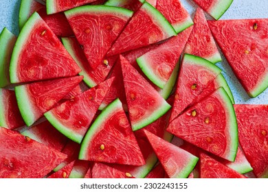 Macro sliced watermelon,Red watermelon triangular piece on white blackground - Powered by Shutterstock