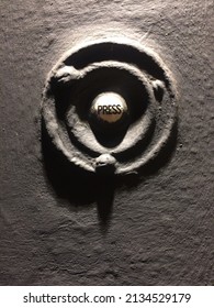 Macro Street Photography Of Abstract Vintage Style Doorbell. Image Depicts Textures Fine Detail And Dark Moody Shadows