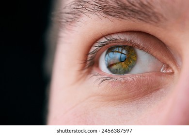 Macro Studio Expression Shot Of Young Man's Eye With Close Up On Eyelashes And Pupil