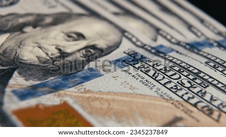 Macro texture banknotes shot close up 100 american dollar bills. Cash money banknotes. Franklin face texture, USD cash macro view.