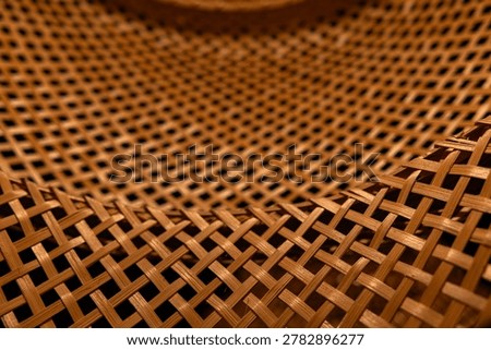 Macro texture of braided bamboo wicker panel natural rattan material background
