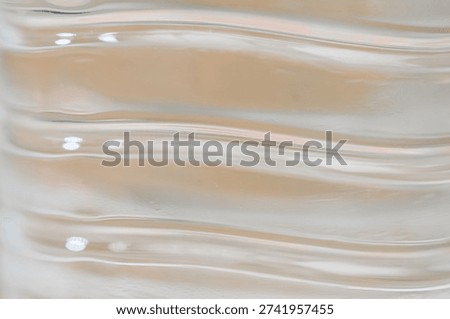 Macro Texture of Clear Ribbed Plastic Water Bottle Surface