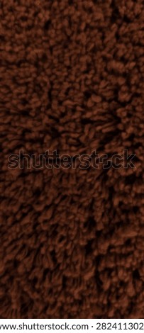 Macro texture of fluffy high pile shag rug with curly deep brown wool yarn threads for cozy modern interior rendering and micro fabric shading material asset
