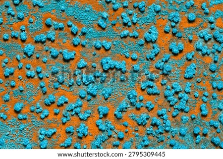 Macro texture of oxidized copper with turquoise verdigris crystals, mineral deposits and natural corrosion patterns