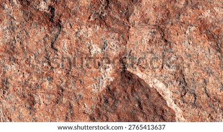 Macro texture of red granite stone surface with natural cracks and rough mineral crystalline patterns