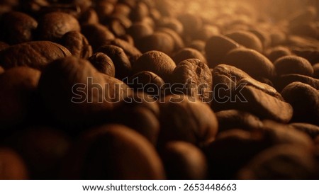 Macro View Of Aromatic Roasted Coffee Beans. Natural textured surface. Rich aroma, caffeine concept. Morning energy. Fresh organic seeds. Brazilian arabica harvest. High quality