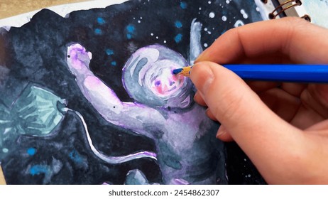 Macro view of artist adding detail to watercolor sketch using blue color pencil. POV drawing astronaut in cosmos. Cosmonaut in outer space. Sketching illustration. Film grain texture. Soft focus. Blur - Powered by Shutterstock