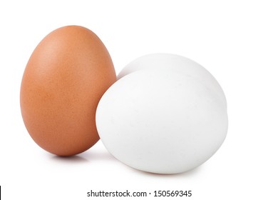 Macro View Of Brown And White Eggs On The White Background