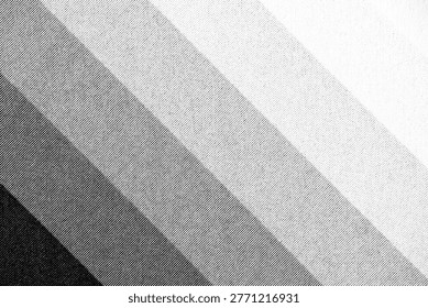 Macro view of diagonal halftone stripes transitioning from black to white, revealing fine dot patterns and printed texture.